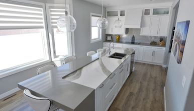 Kitchen with white custom cabinetry
